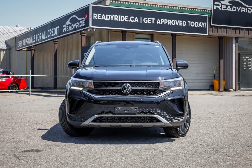 Volkswagen Taos outside the Ready Ride Ottawa showroom